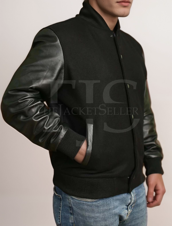 Black varsity jacket with durable ribbed cuffs and hem