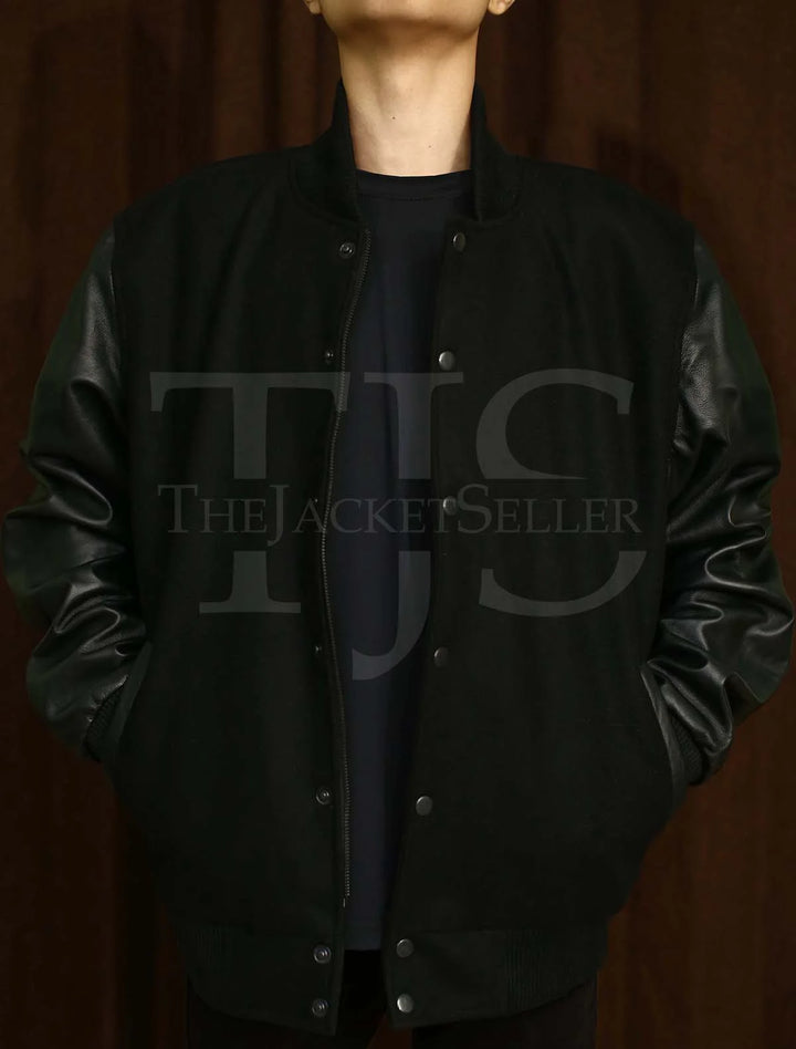 Black wool varsity jacket with functional side pockets