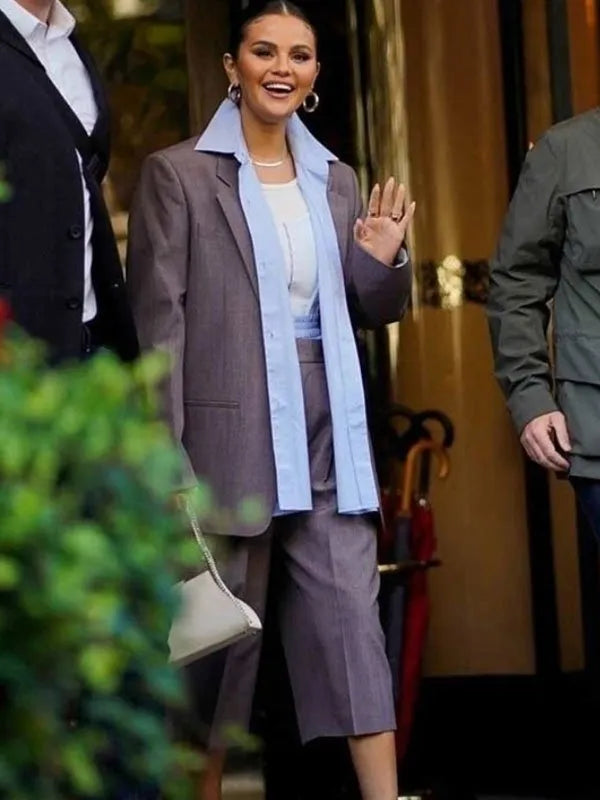 Chic grey blazer worn by American singer Selena Gomez in France style