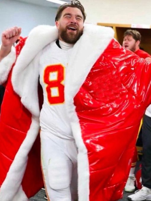 Person wearing a large red and white inflatable costume with number 8 on a plain background