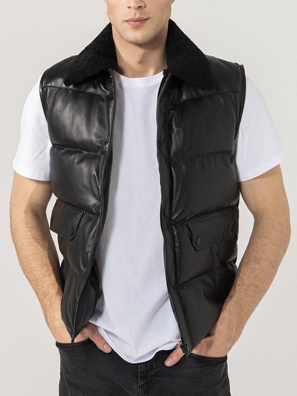 Men's sleek black leather puffer vest in USA