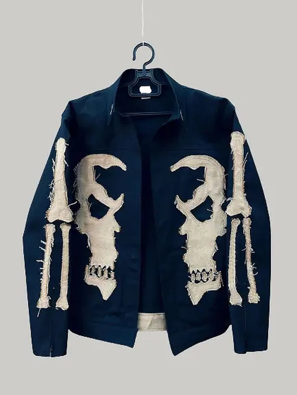 Navy blue jacket with white skeleton design on a gray background