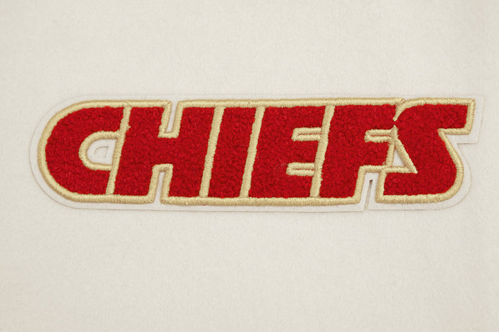 Retro wool varsity jacket featuring Kansas City Chiefs team colors and logos.