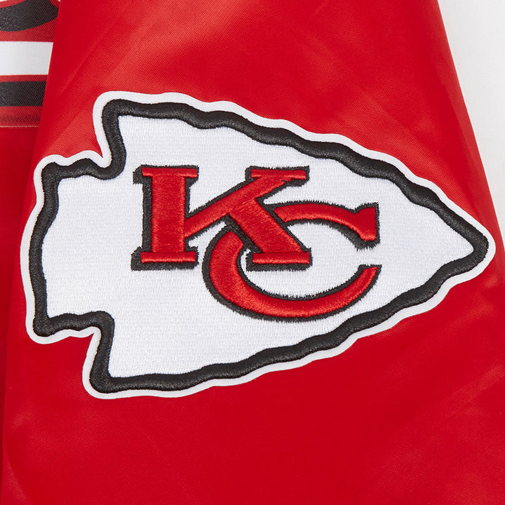 Large Kansas City Chiefs logo on the back of the red jacket.