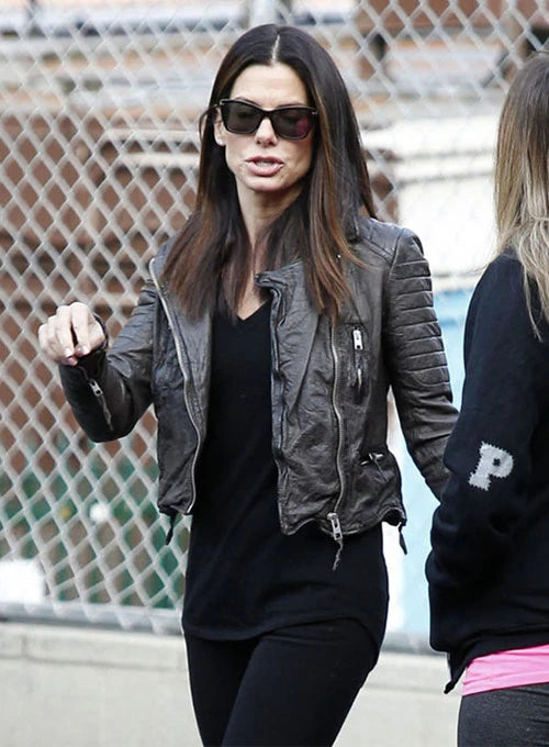 Sandra Bullock sleek leather jacket outfit in USA