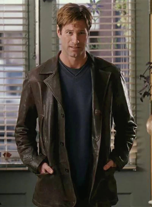 Aaron Eckhart in a stylish leather trench coat in UK style