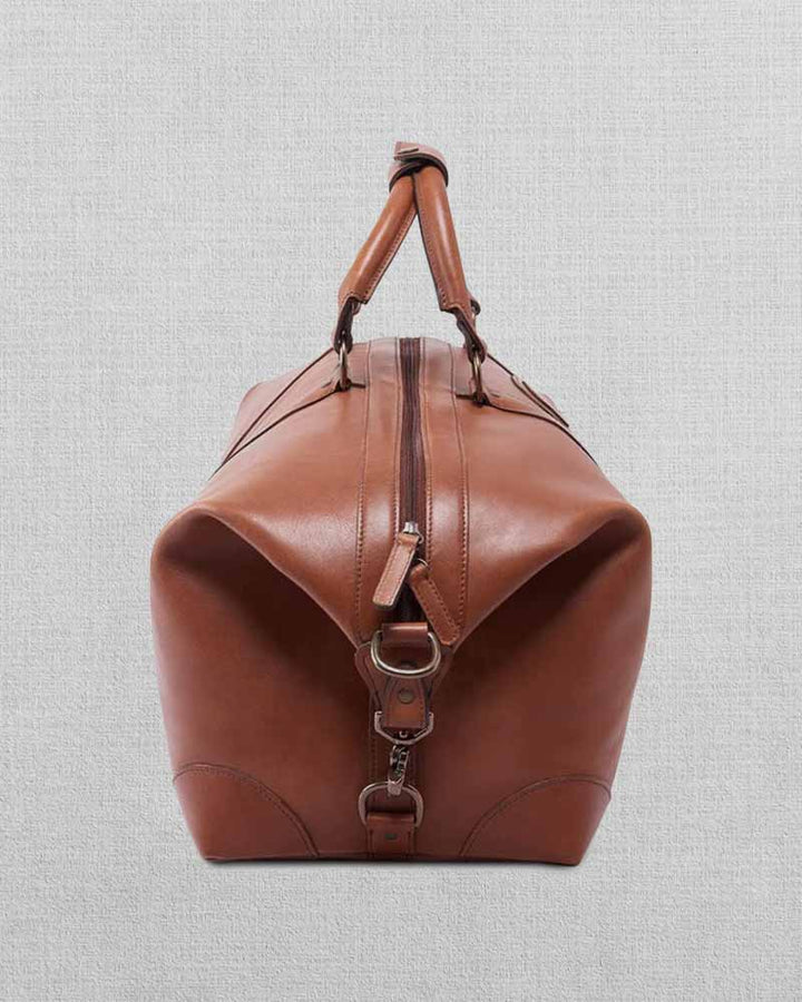 Vintage-inspired leather duffle for travel or everyday use in UK