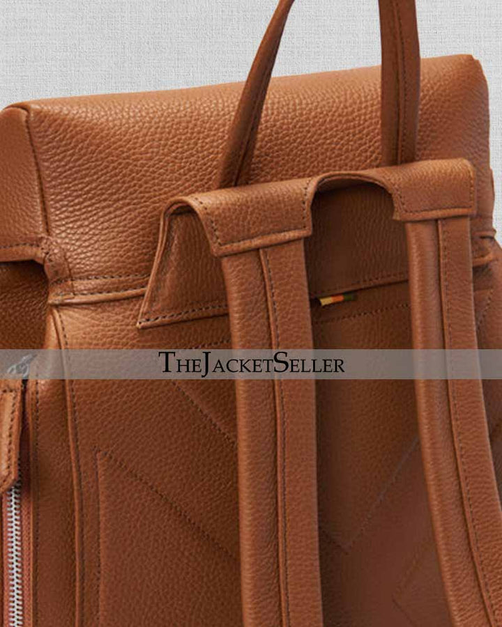 Versatile tan leather bag with buckle fastening in USA market