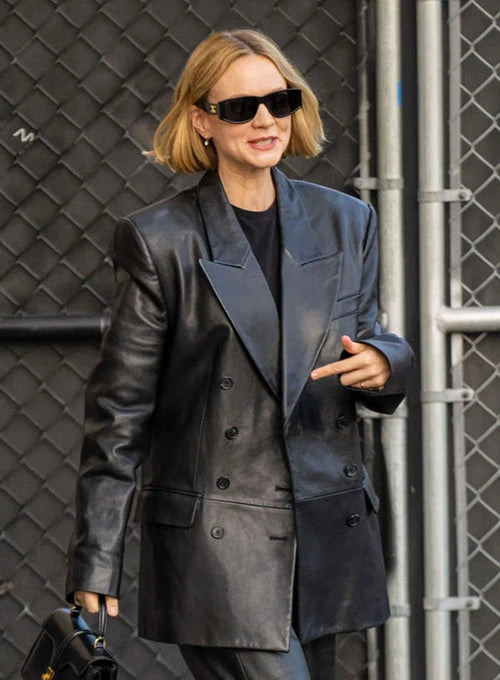 Leather trench coat worn by Carey Mulligan adds a touch of glamour to her outfit in American style