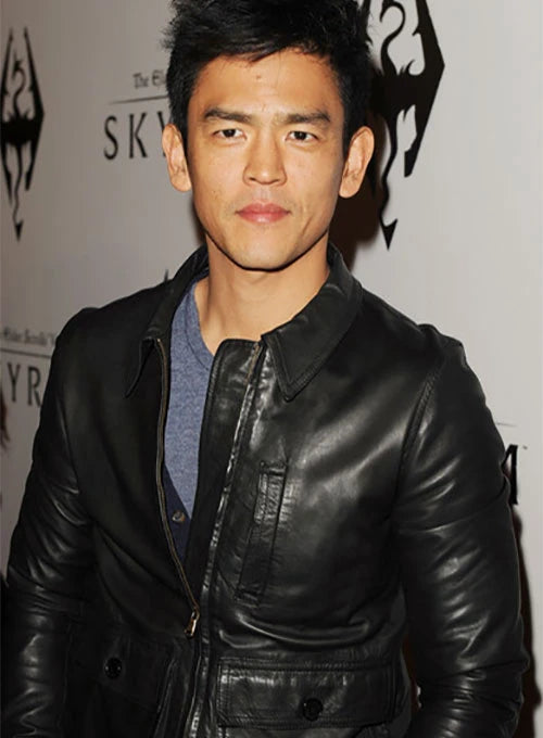 Leather jacket adds edge to John Cho's outfit in France market