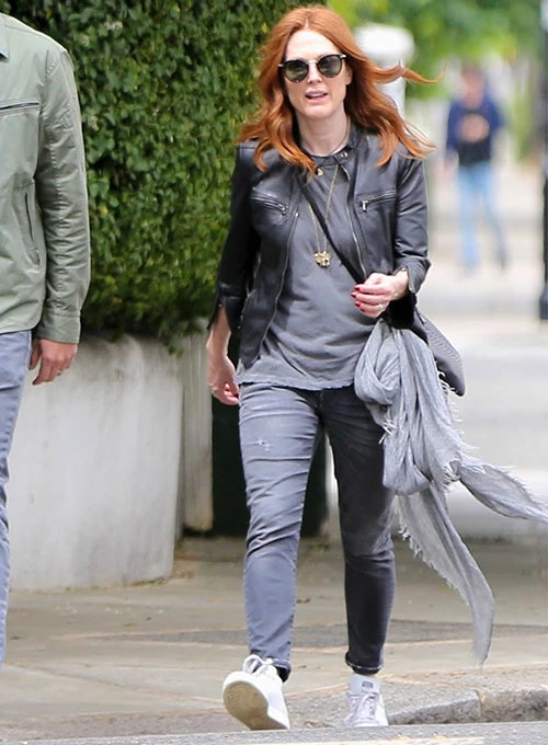 Actress Julianne Moore adding a touch of edge to her outfit with a leather jacket in US style