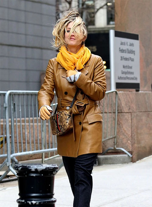 Sleek and sophisticated: Kaley Cuoco in leather trench coat in France market